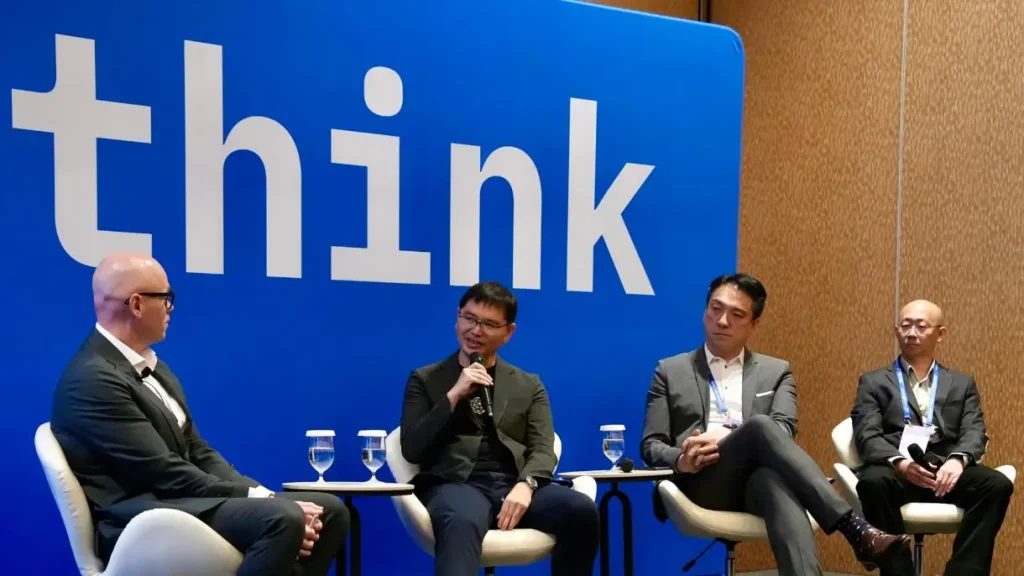 Guo Jinghua (second from left), participating in a panel discussion on the DIS and DSTA's collaboration with IBM on the use of quantum computing.